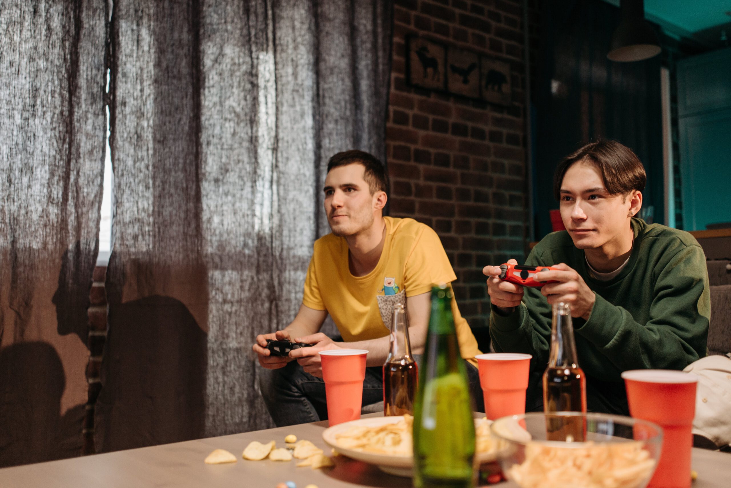 Illustration of Friends Playing a Video Game for the article titled Unforgettable Super Bowl 2024: DIY Party Tips and Game Ideas for the Ultimate Football Celebration photographed by Pavel Danilyuk