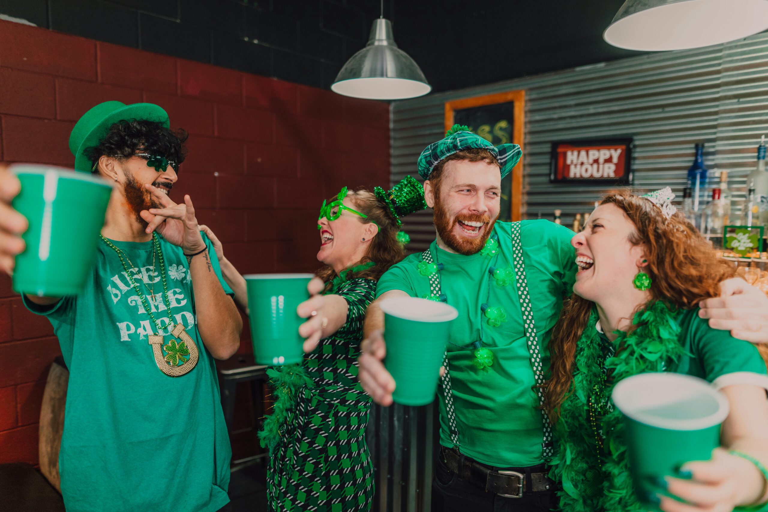 Illustration of Happy Friends Together at a Pub for the article titled St. Patrick's Day 2024: All You Need to Know About Irish Clubbing Fashion, Dance Moves, and Music photographed by RDNE Stock project
